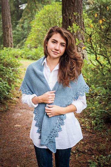 Model wearing the black raspberry shawl