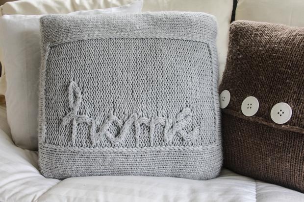 Throw pillows with outlet writing on