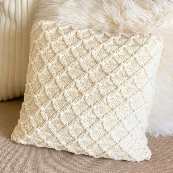 Cream cable knit online pillow