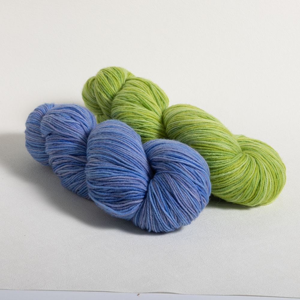 Stroll Tonal - 75% superwash merino and 25% nylon yarn in hanks of blue, coral, mustard and sage green