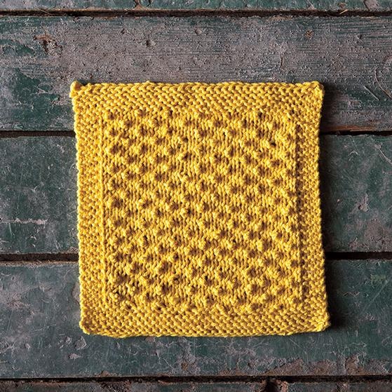 Citrine Dishcloth: a yellow knitted dishcloth. Perky little nubbins in nice, orderly rows give this pattern just the right amount of texture to get the job done. The bumps are easy to make without any decreases or increases necessary, just clever little “chains” of knit stitches that pucker forward on the following row.