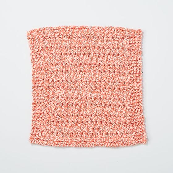 Garter Lace Dishcloth: Get a taste of lace knitting with this easy project. With a row of decreases and a row increases separated by bands of stockinette, this project works up quickly and is a wonderful addition to your kitchen.